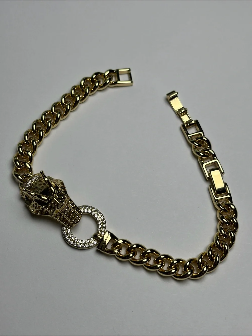 Gold Tone Panther Link Bracelet with Crystal Circle Accent